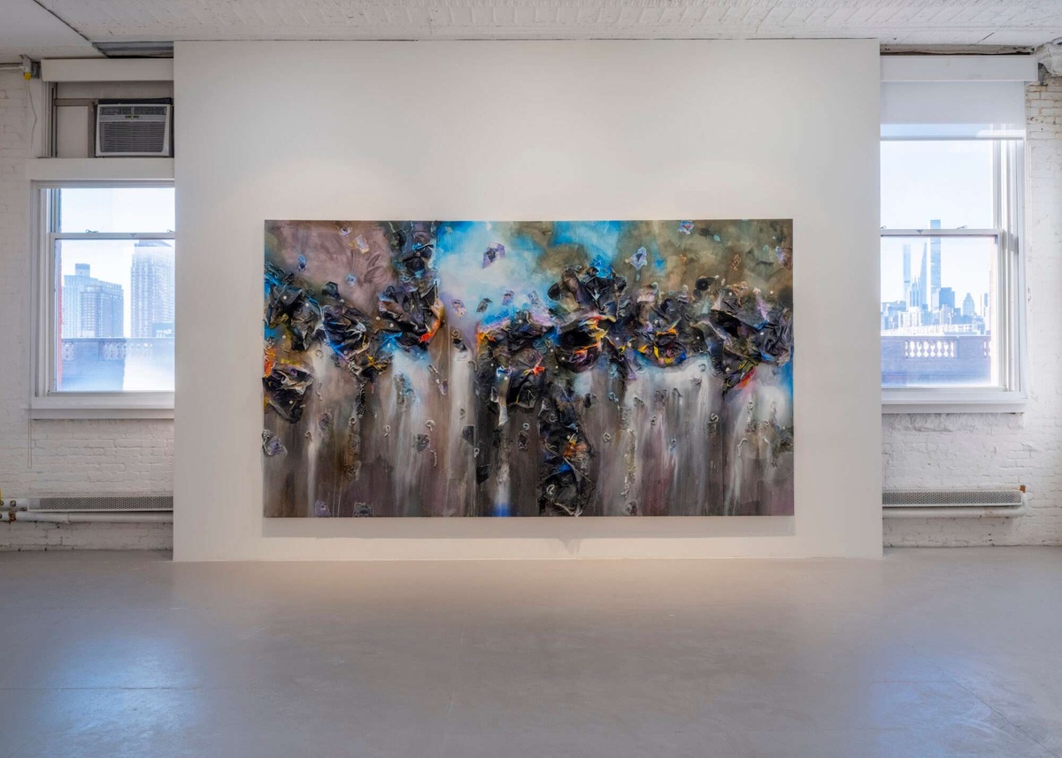 A large abstract painting by Leslie Martinez hangs on the wall of MoMA PS1.